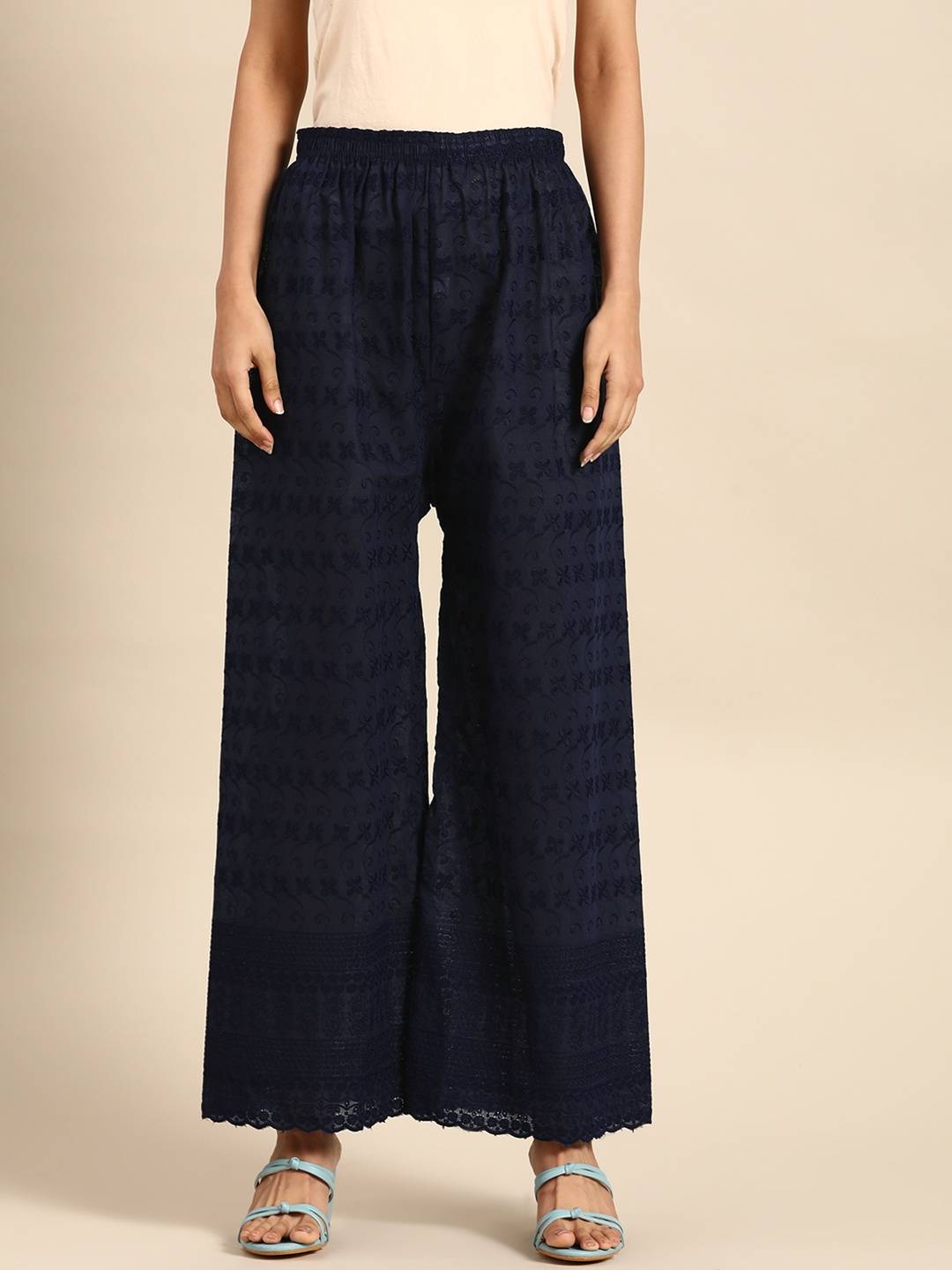 

Saadgi Women Navy Blue Ethnic Motifs Embroidered Knitted Ethnic Palazzos