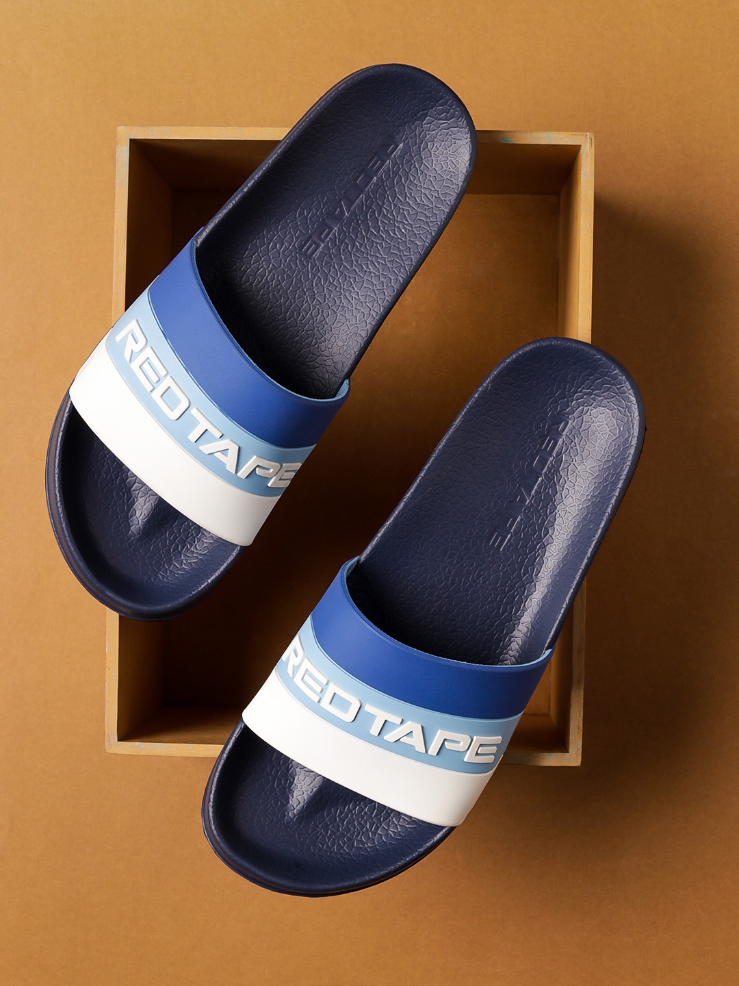 

Red Tape Men Blue & White Striped Rubber Sliders