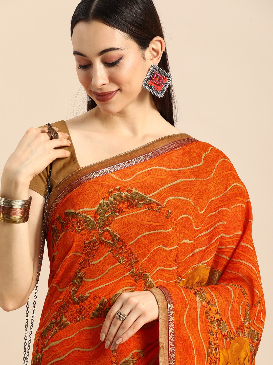 

Anouk Orange Woven Design Pure Georgette Bhagalpuri Saree