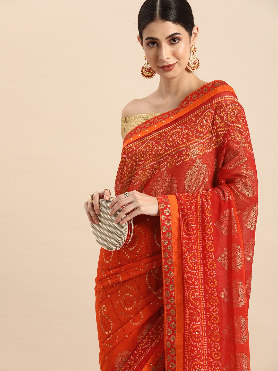 

Anouk Orange & Red Beads and Stones Detail Pure Georgette Bhagalpuri Saree