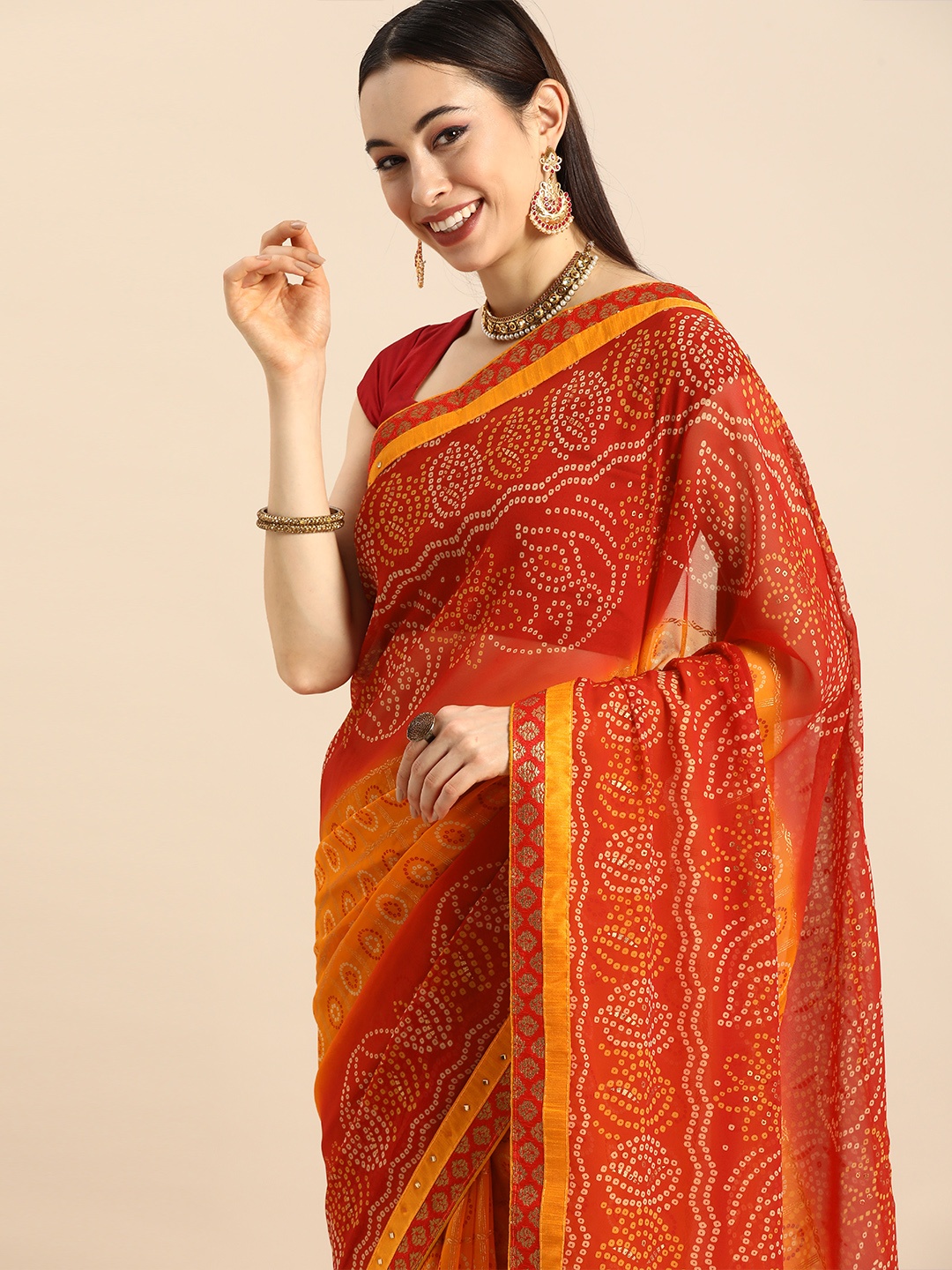 

Anouk Red & Yellow Beads and Stones Detail Pure Georgette Bhagalpuri Saree
