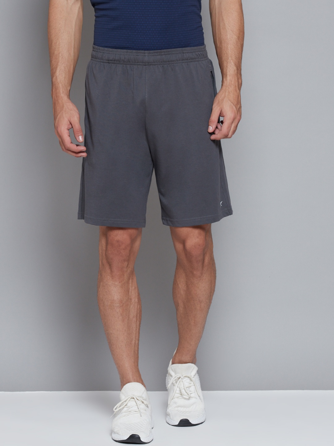 

Reebok Men Charcoal Grey Solid Mid-Rise Pure Cotton Training or Gym Sports Shorts
