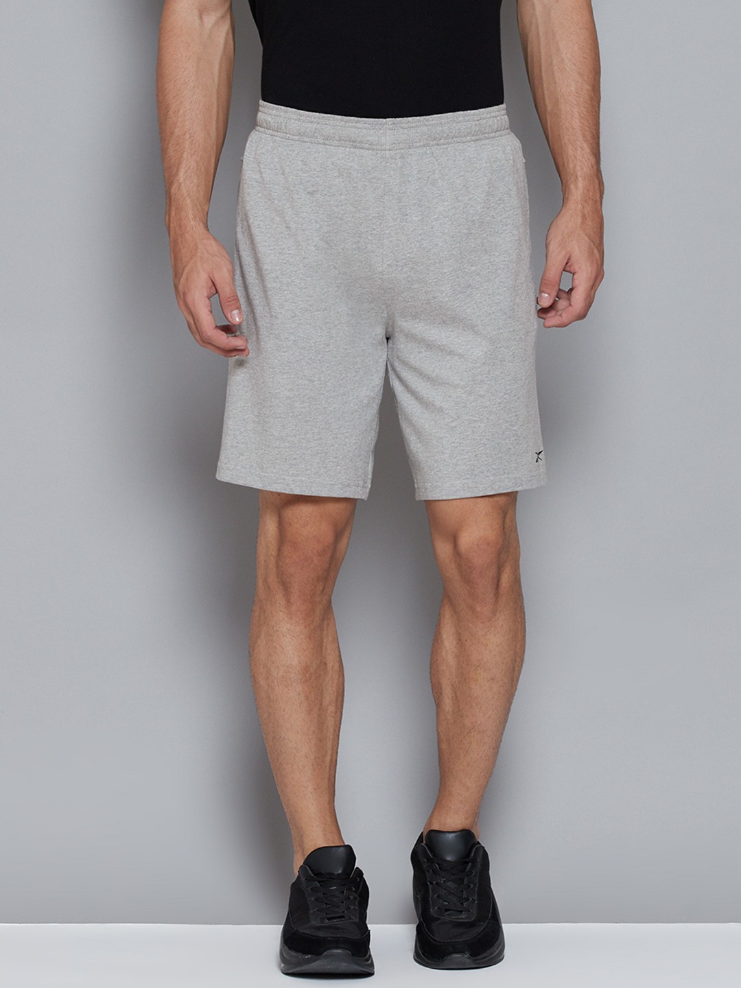 

Reebok Men Grey Solid Pure Cotton Mid-Rise Training or Gym Sports Shorts