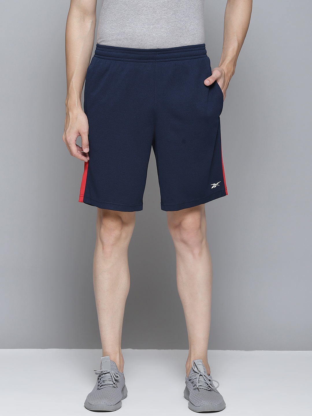 

Reebok Men WF Solid Training Shorts, Navy blue
