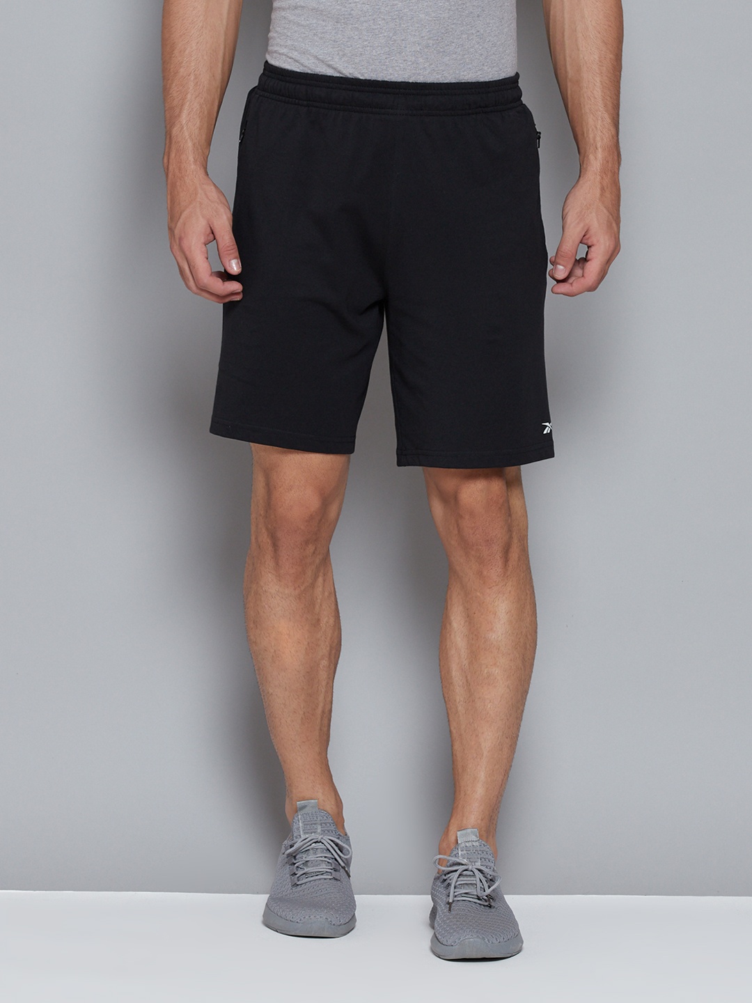 

Reebok Men Black Solid Pure Cotton Mid-Rise Training or Gym Sports Shorts