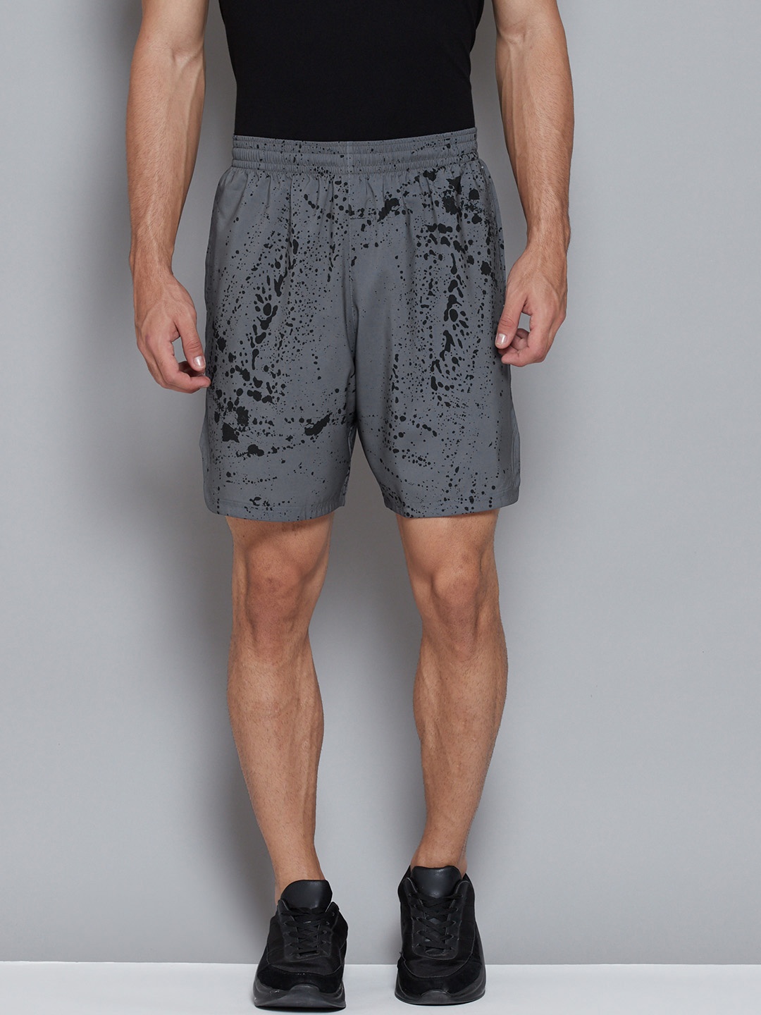 

Reebok Men Blue Printed Mid-Rise Speedwick Workout AOP Sports Shorts