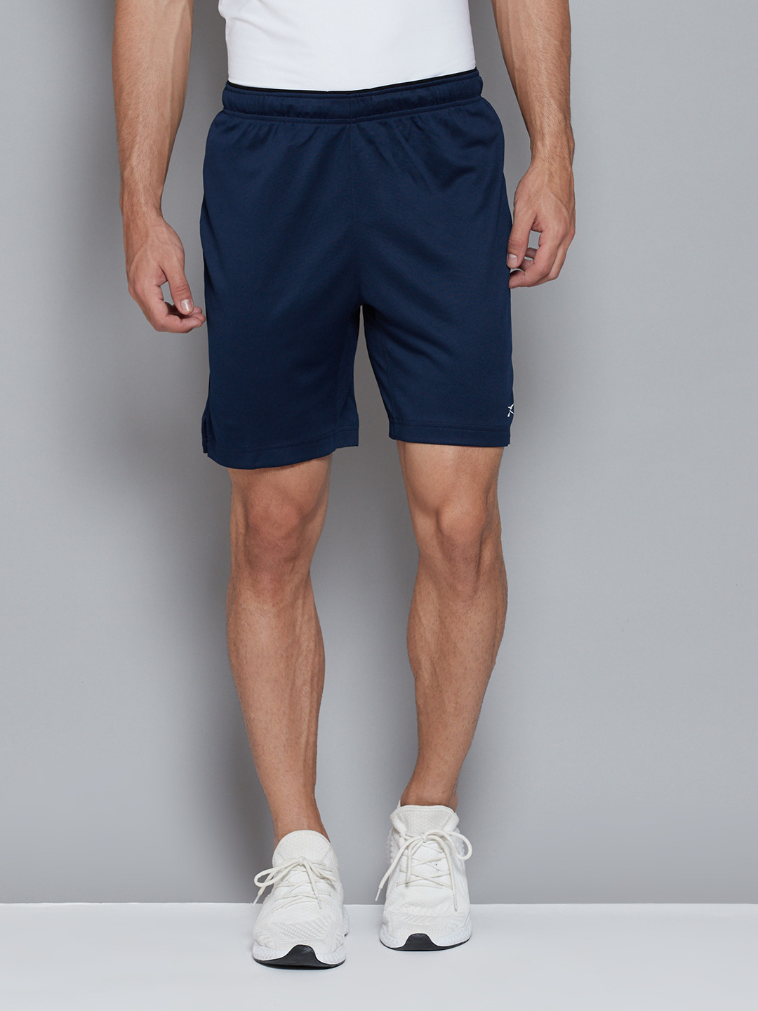 

Reebok Men Navy Blue Mid-Rise WORKOUT Speedwick Sports Shorts