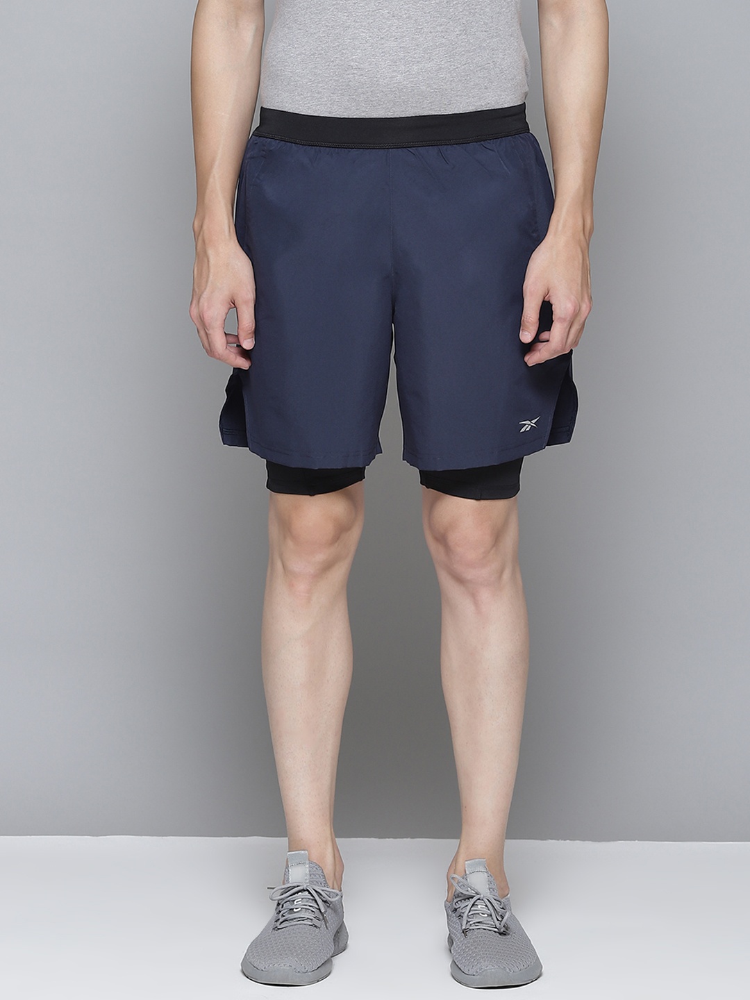 

Reebok Men Navy Running Essential 2-IN-1 Solid Shorts, Navy blue