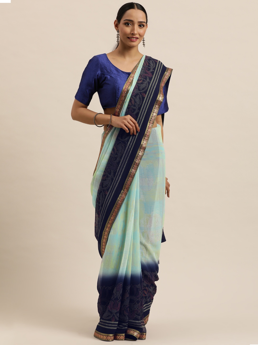 

Triveni Blue & Green Pure Georgette Saree