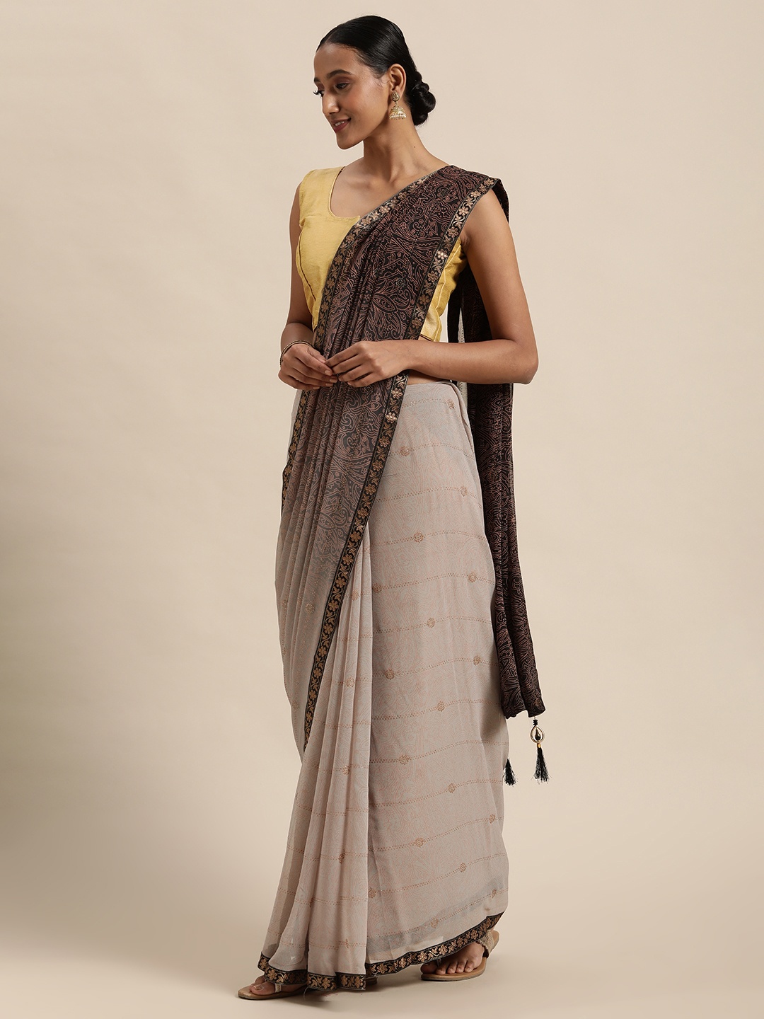

Triveni Grey Ethnic Motifs Beads and Stones Pure Georgette Saree