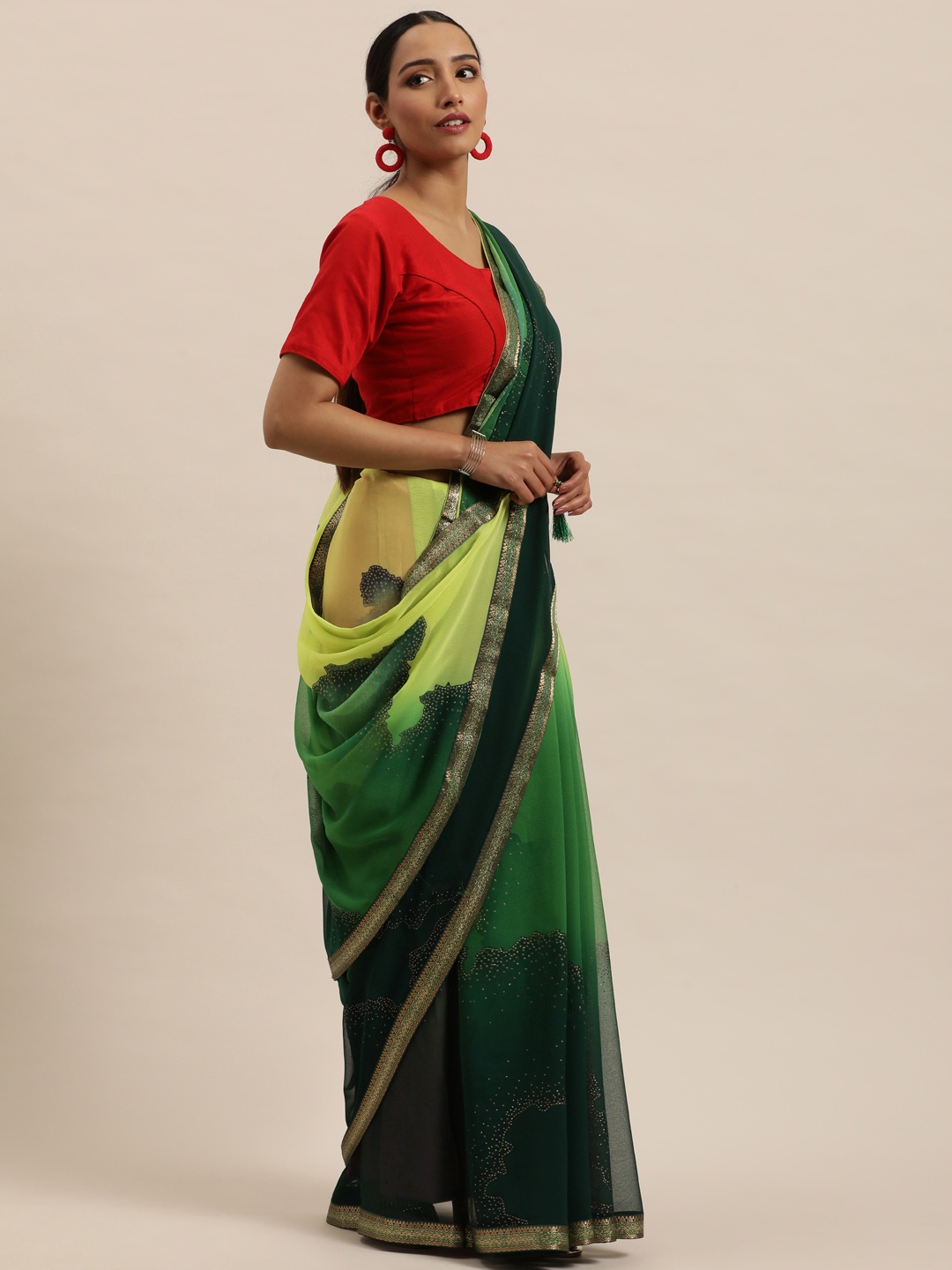 

Triveni Green & Yellow Embellished Beads and Stones Pure Georgette Saree