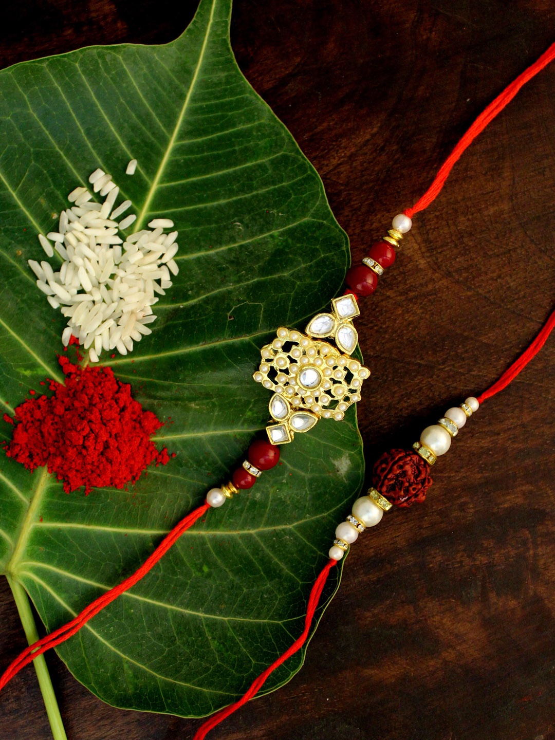 

KARATCART Set of 2 Gold-Plated & Red Kundan Rakhi