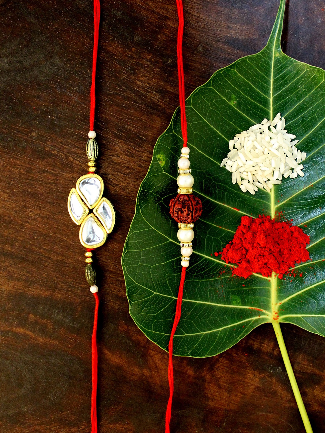 

KARATCART Set of 2 Gold-Plated & Red Kundan Rakhi