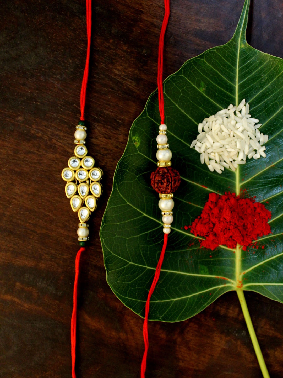 

KARATCART Set of 2 Gold-Plated & Red Kundan Rakhi