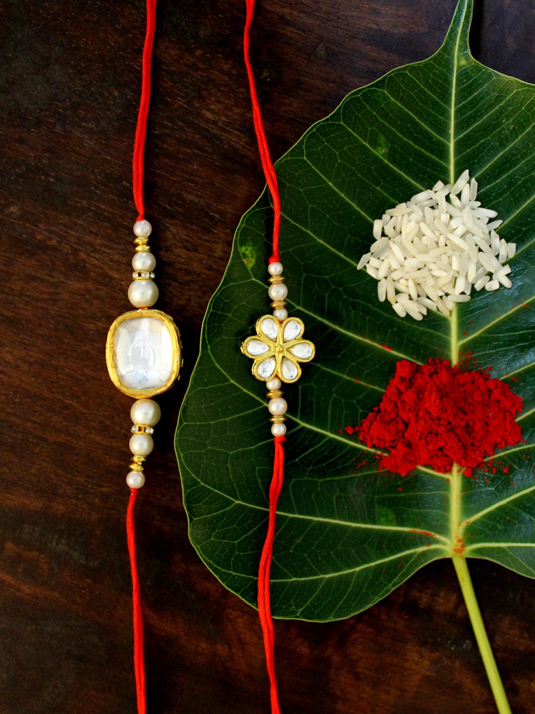 

KARATCART Set of 2 Gold-Plated & Red Kundan Rakhi