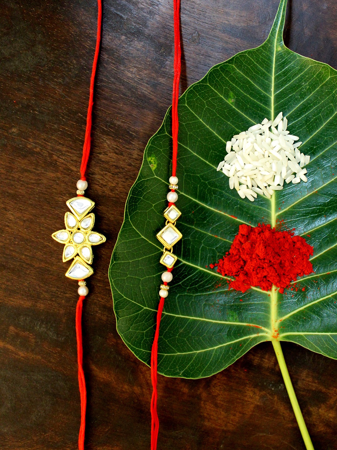 

KARATCART Set of 2 Gold-Plated & Red Kundan Rakhi
