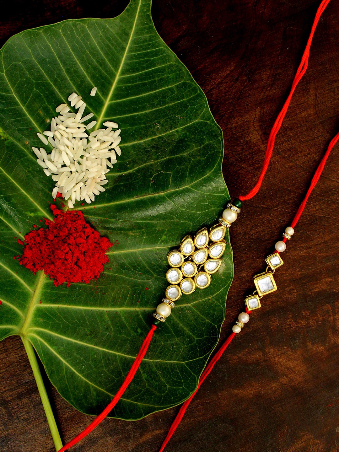 

KARATCART Set of 2 Gold-Plated & Red Kundan Rakhi