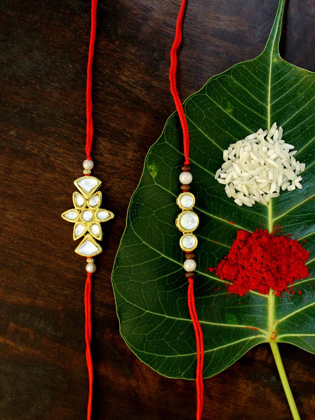 

KARATCART Set of 2 Gold-Plated & Red Kundan Rakhi