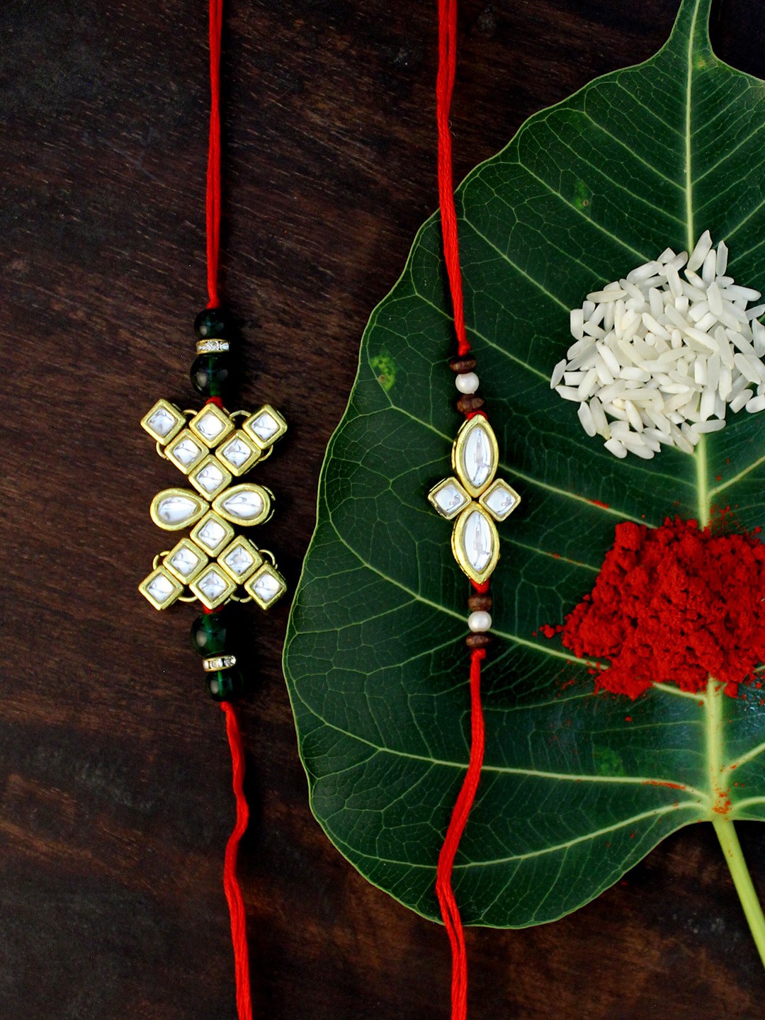 

KARATCART Set of 2 Gold-Plated & Red Kundan Rakhi