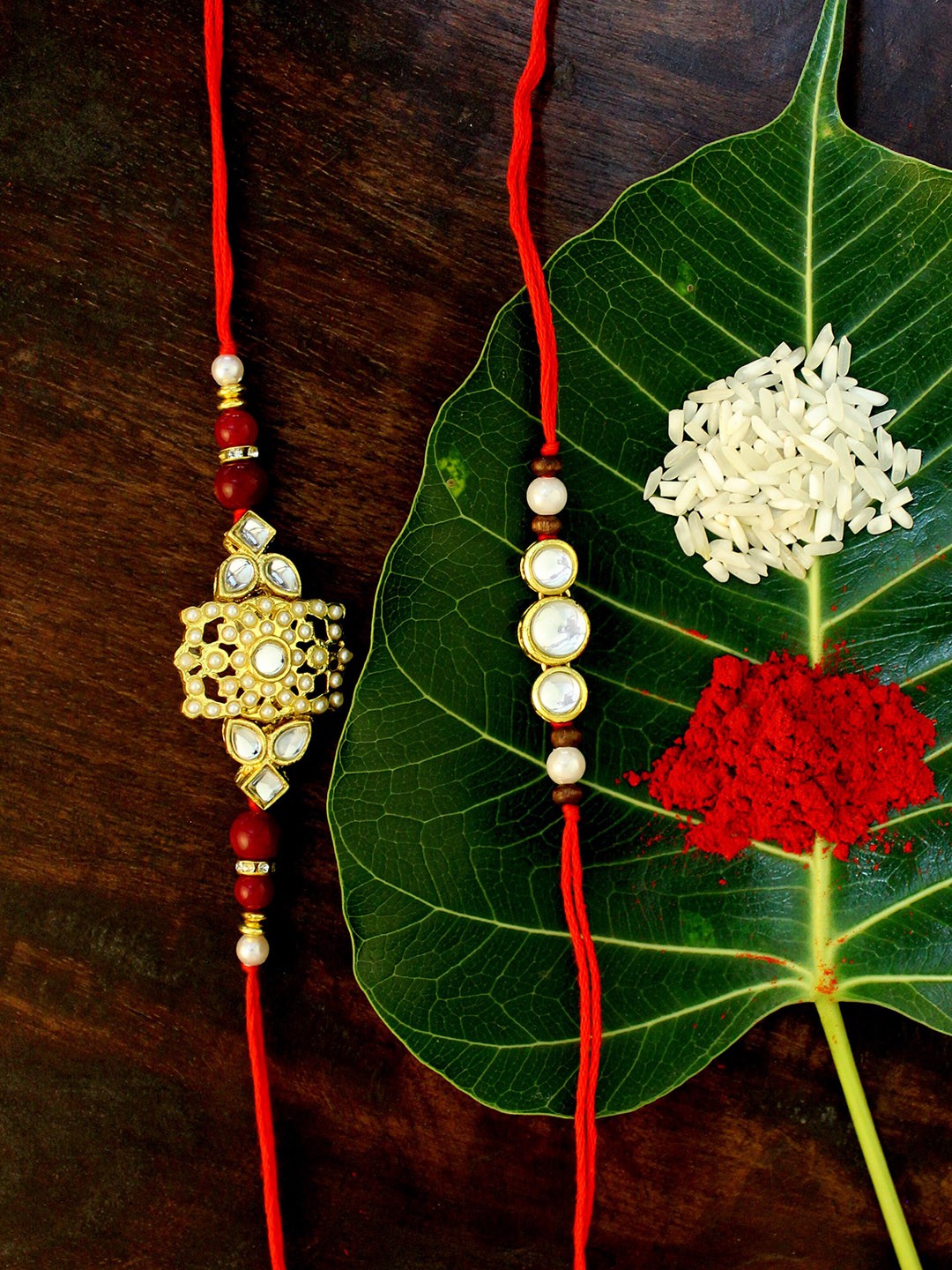 

KARATCART Set of 2 Gold-Plated & Red Kundan Rakhi