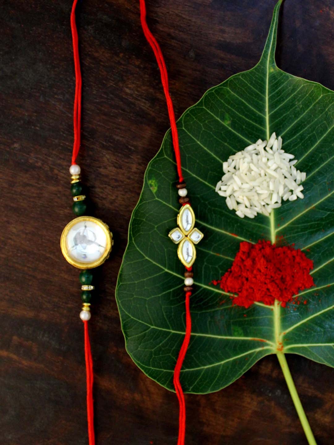 

KARATCART Set of 2 Gold-Plated & Red Kundan Rakhi