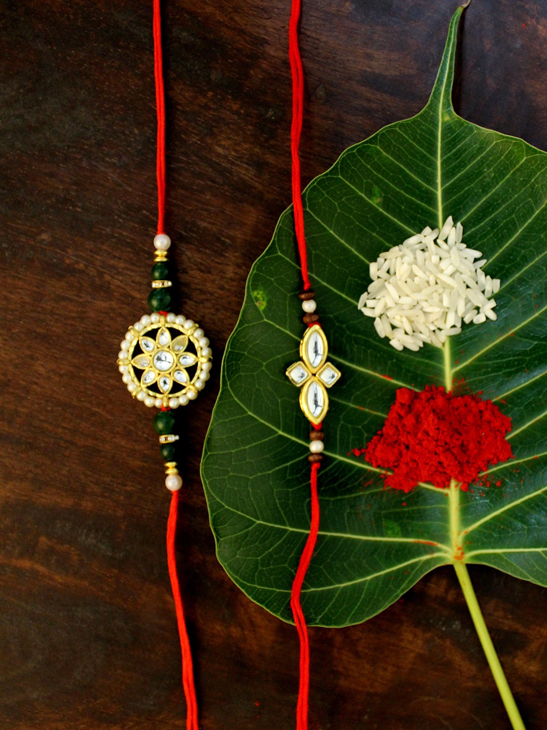 

KARATCART Set of 2 Gold-Plated & Red Kundan Rakhi