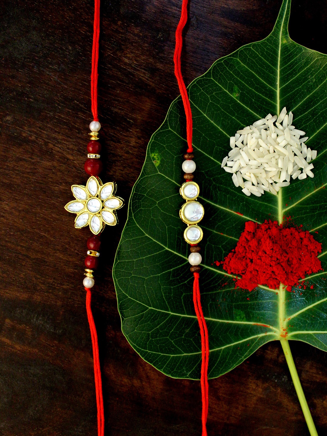 

KARATCART Set of 2 Gold-Plated & Red Kundan Rakhi