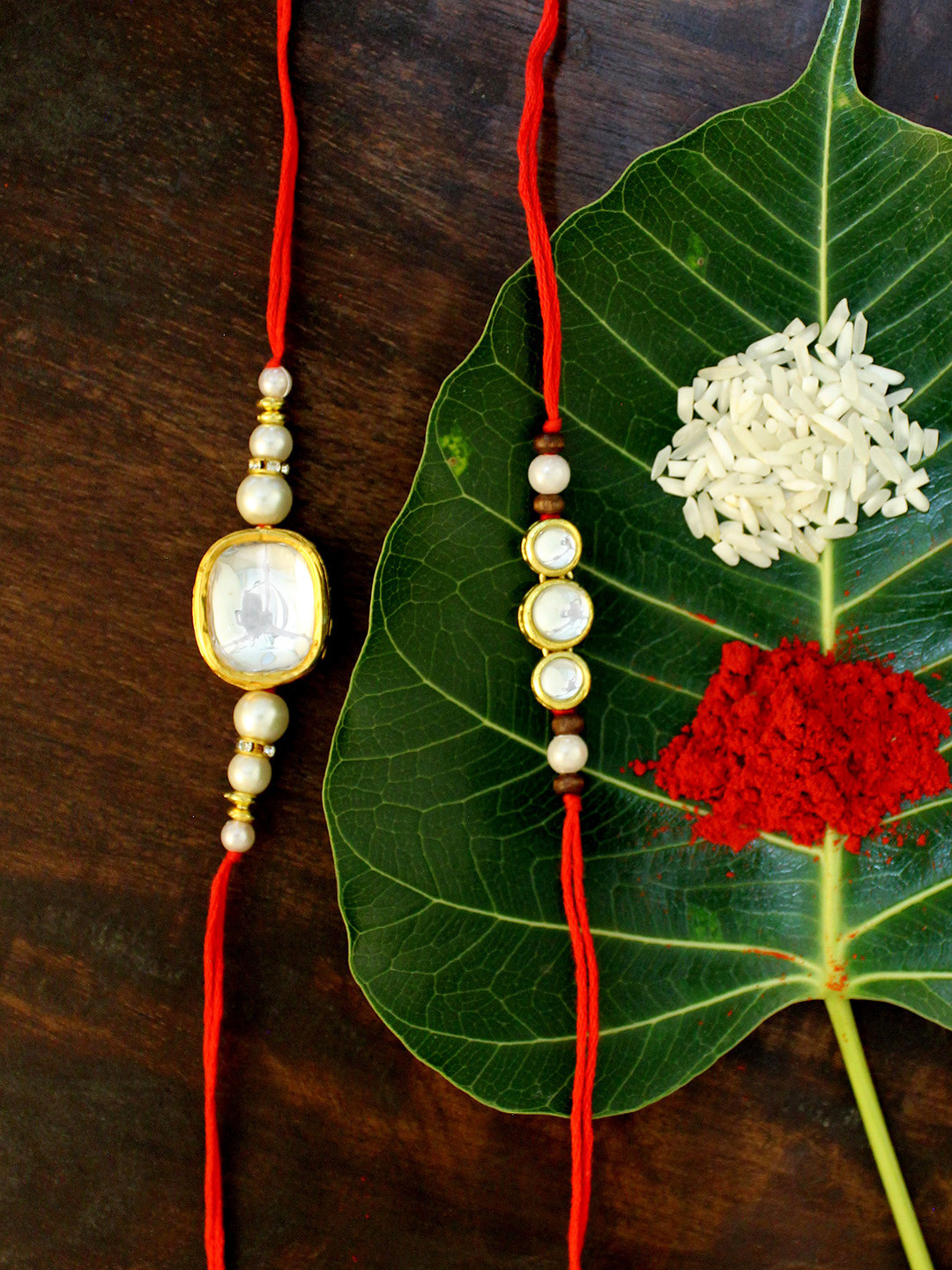 

KARATCART Set of 2 Gold-Plated & Red Kundan Rakhi