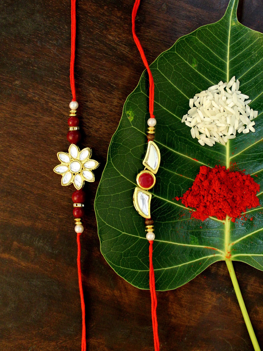 

KARATCART Set of 2 Gold-Plated & Red Kundan Rakhi