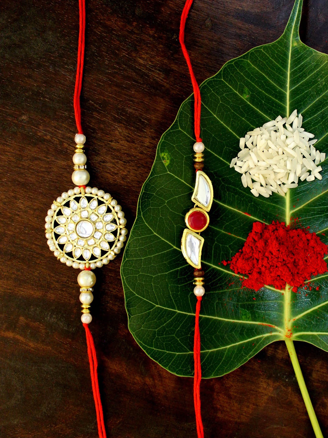 

KARATCART Set of 2 Gold-Plated & Red Kundan Rakhi