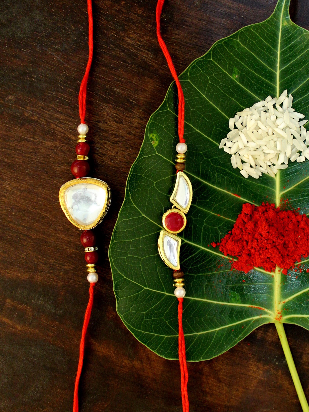 

KARATCART Set of 2 Gold-Plated & Red Kundan Rakhi