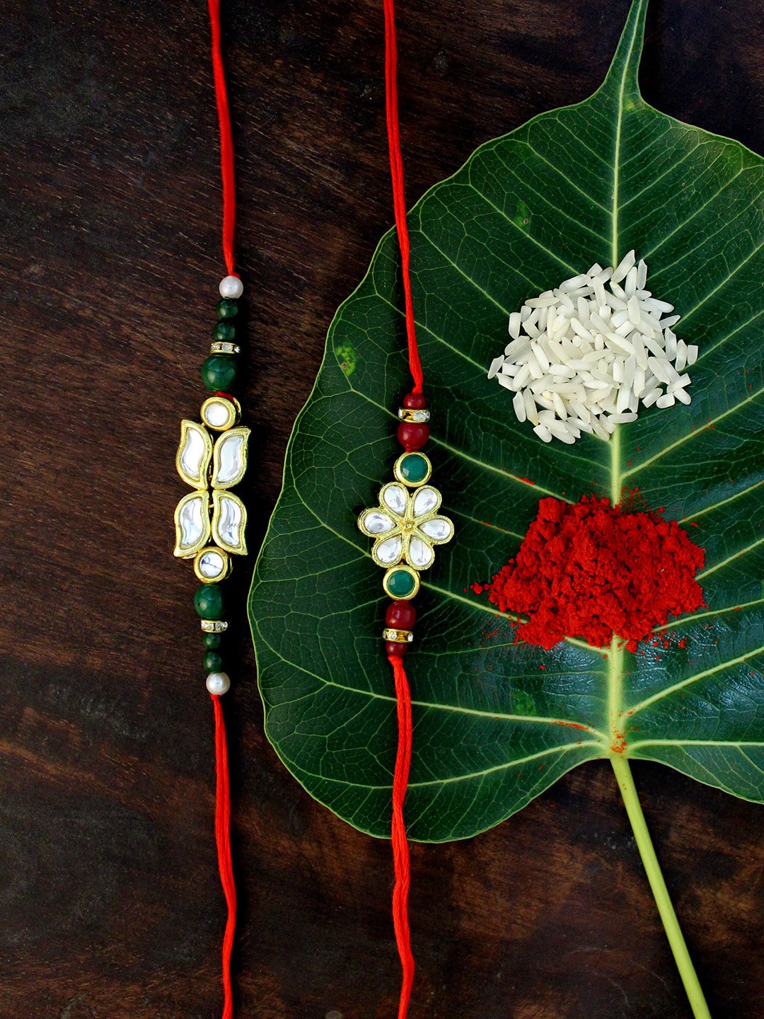 

KARATCART Set of 2 Gold-Plated & Red Kundan Rakhi