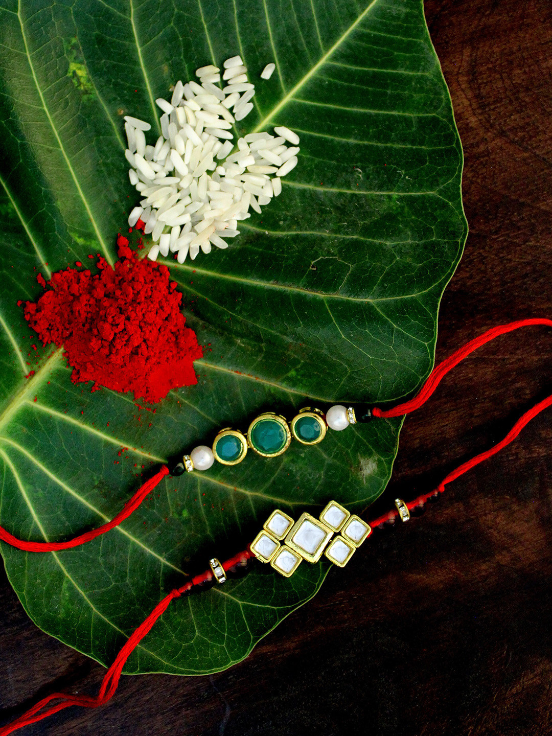 

KARATCART Set of 2 Gold-Plated & Red Kundan Rakhi