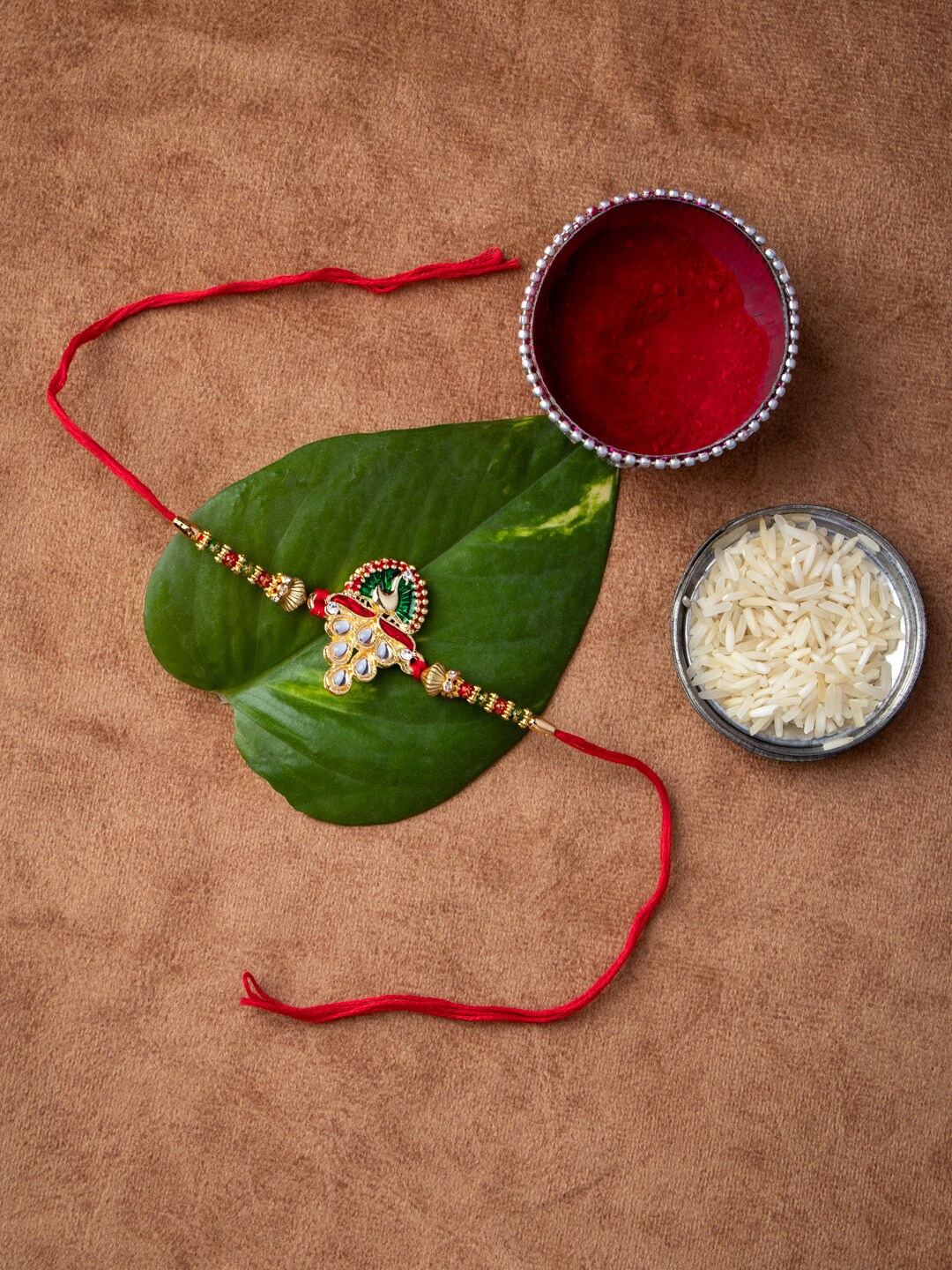 

MORKANTH JEWELLERY Gold-Toned & Red Brass Handcrafted Rakhi