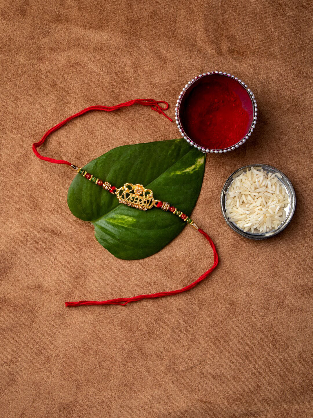 

MORKANTH JEWELLERY Gold-Toned & Red Brass Handcrafted Rakhi