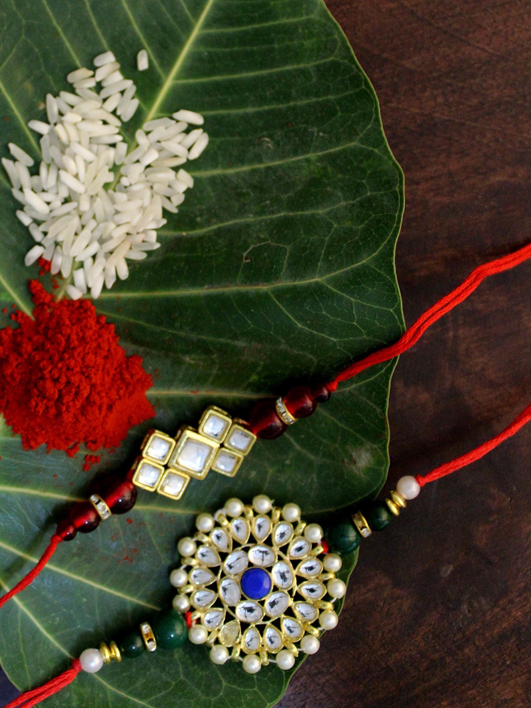 

KARATCART Set of 2 Gold-Plated & Red Kundan Rakhi