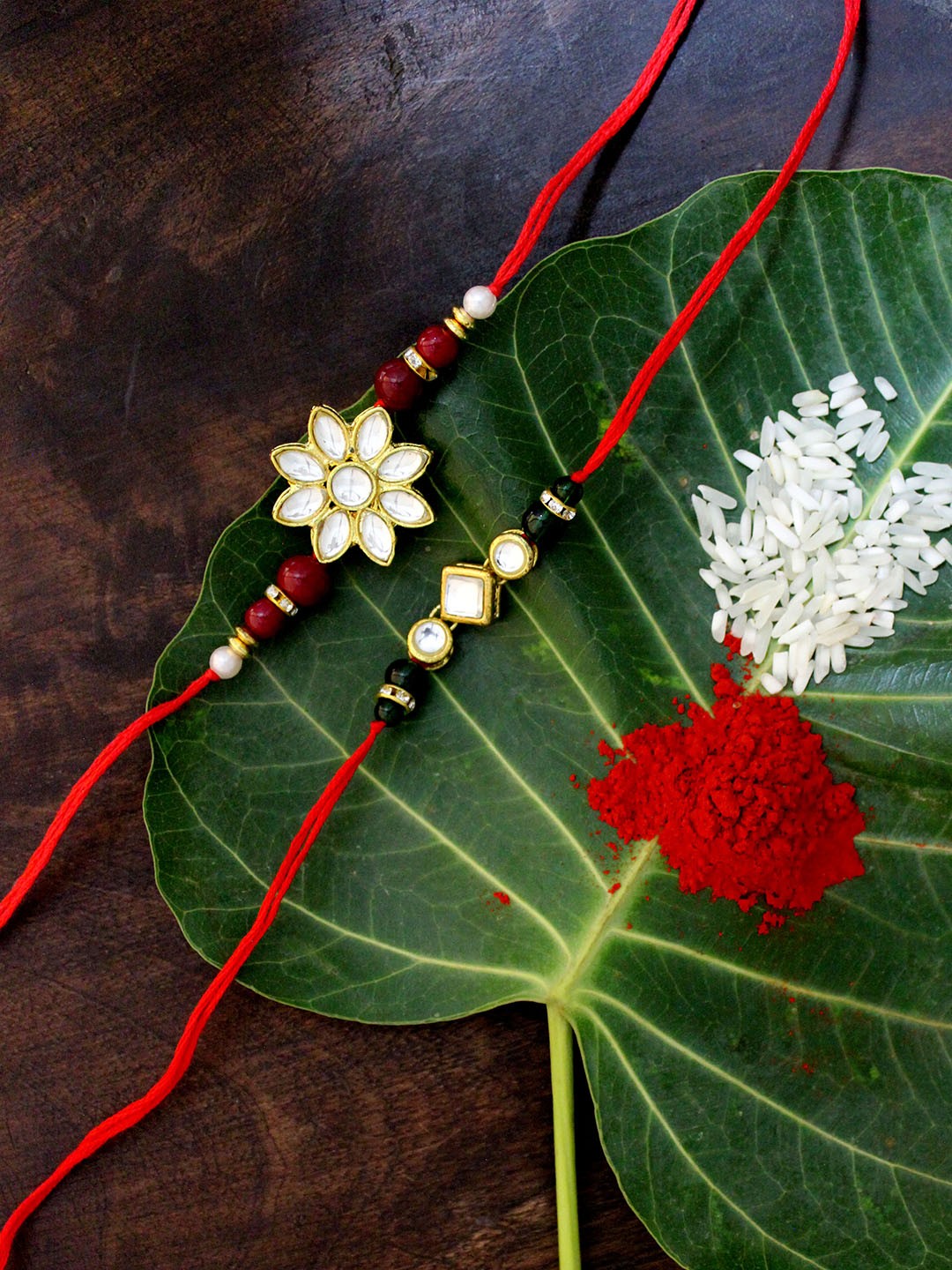 

KARATCART Set of 2 Gold-Plated & Red Kundan Rakhi