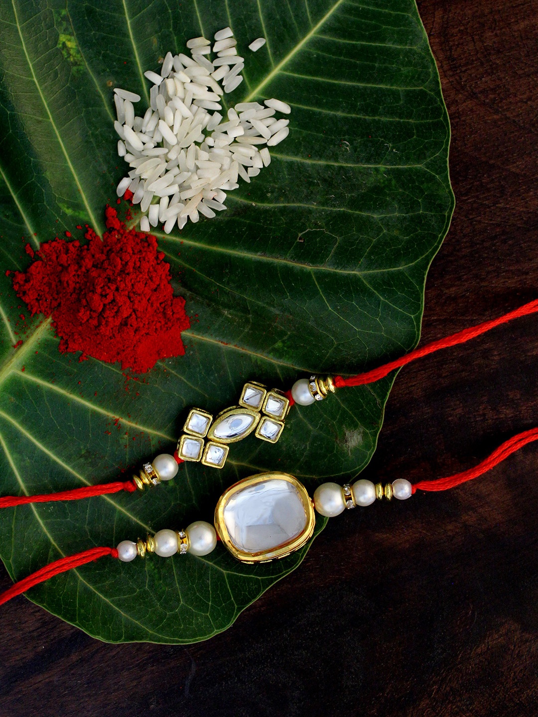 

KARATCART Set of 2 Gold-Plated & Red Kundan Rakhi