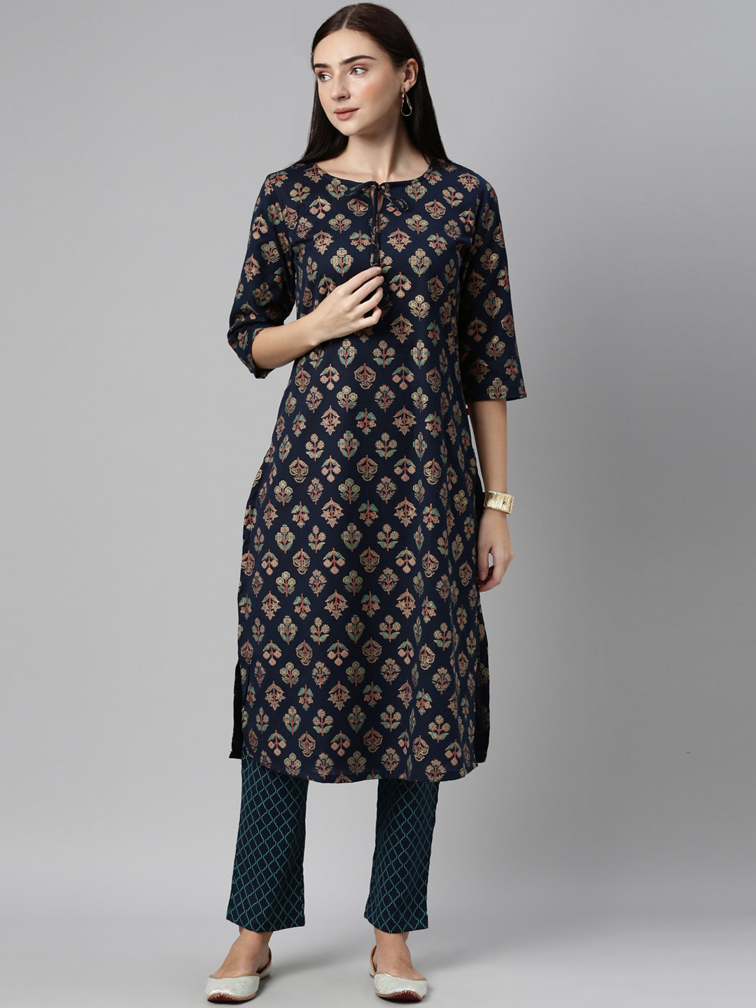 

Alena Women Navy Blue Ethnic Motifs Printed High Slit Kurti With Trousers