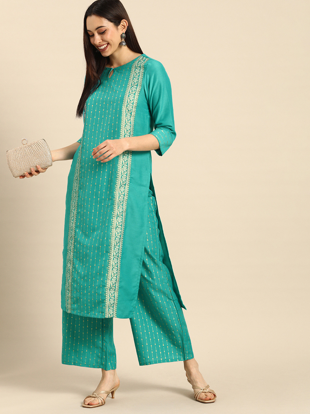 

Anouk Women Turquoise Blue Ethnic Motifs Foil Printed Panelled Kurta with Palazzos