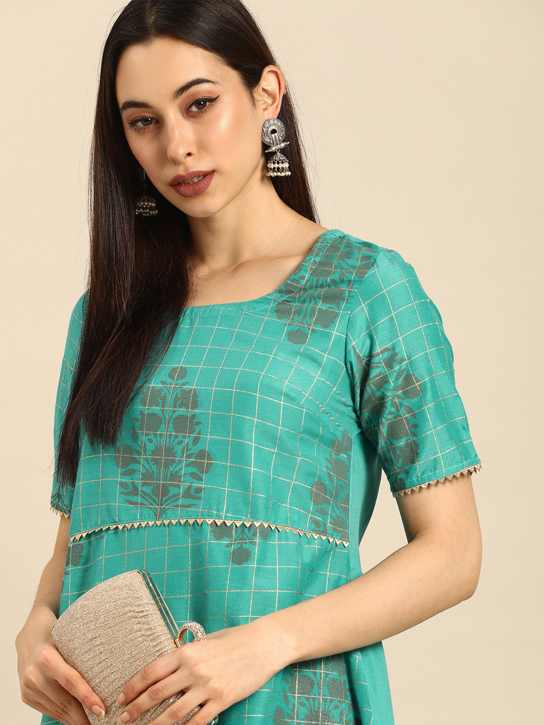 

Anouk Women Turquoise Blue Floral Foil Printed Regular Kurta with Palazzos