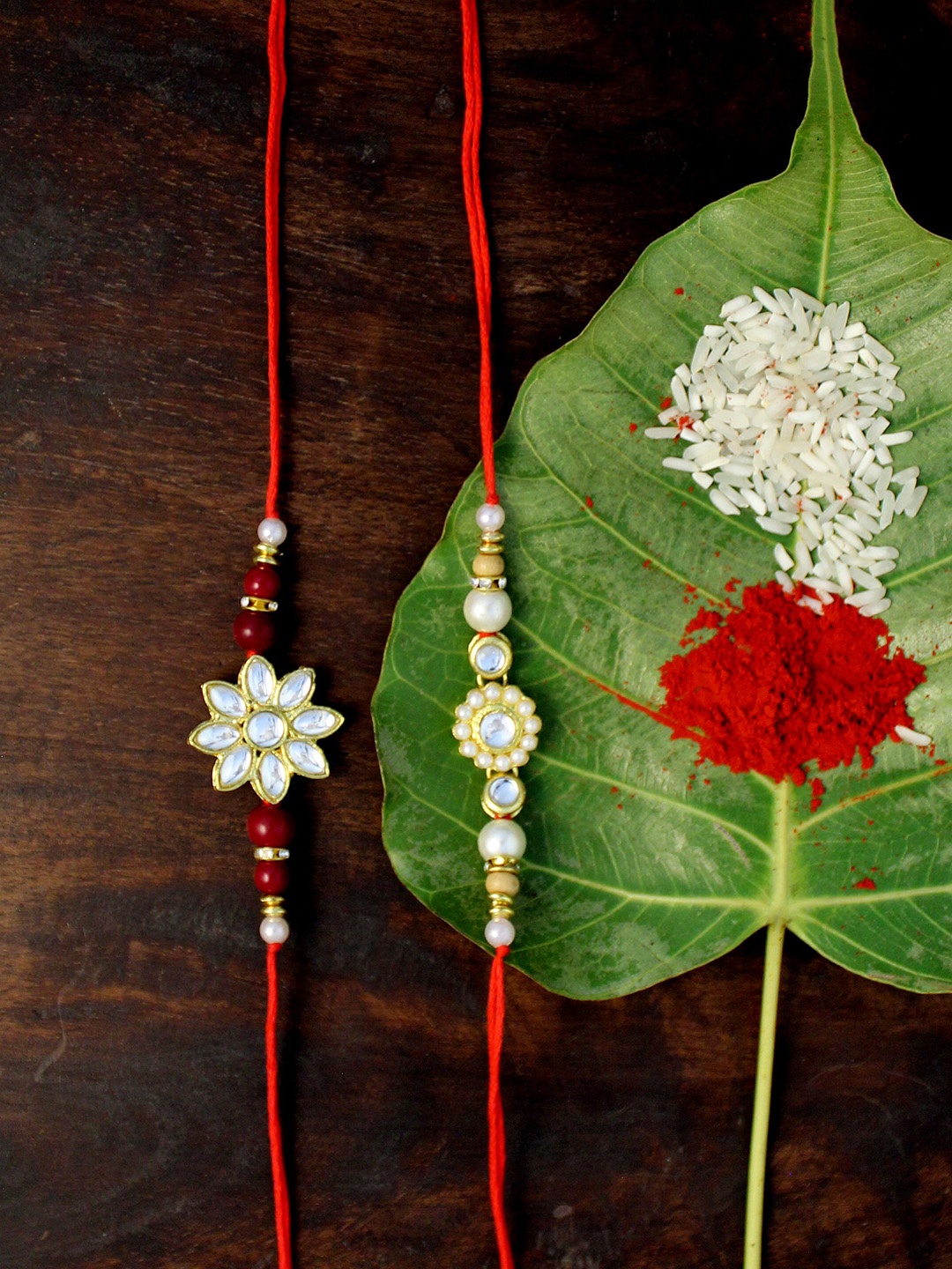 

KARATCART Set of 2 Gold-Plated & Red Kundan Rakhi