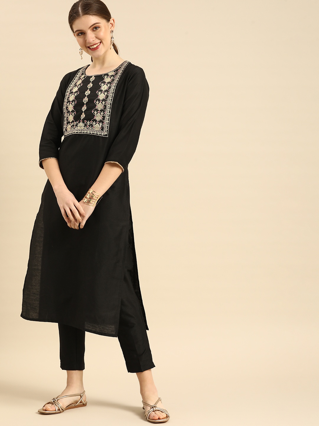 

Anouk Women Black & Golden Ethnic Motifs Embroidered Kurta with Trousers
