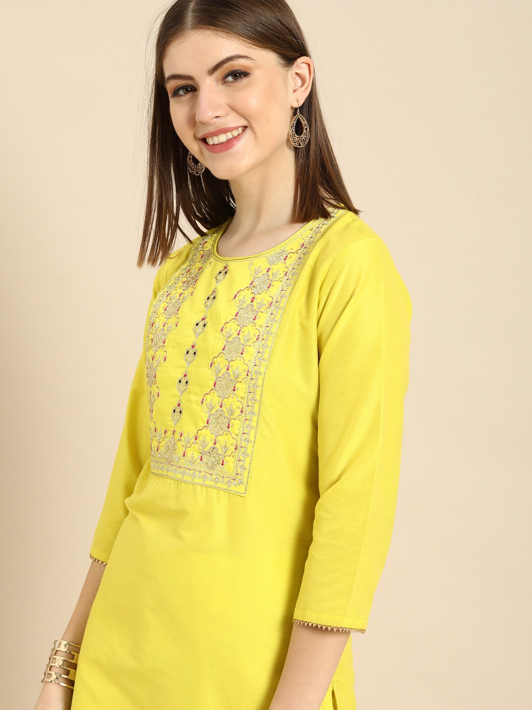 

Anouk Women Yellow Ethnic Motifs Embroidered Sequinned Kurta with Trousers