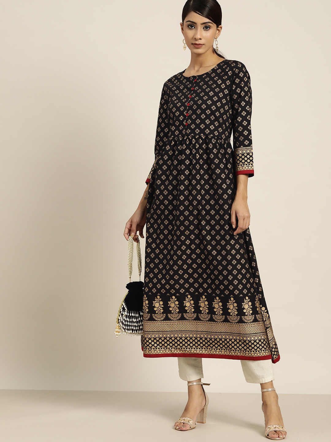 

Moda Rapido Women Black & Golden Ethnic Motifs Printed Pure Cotton A-Line Kurta