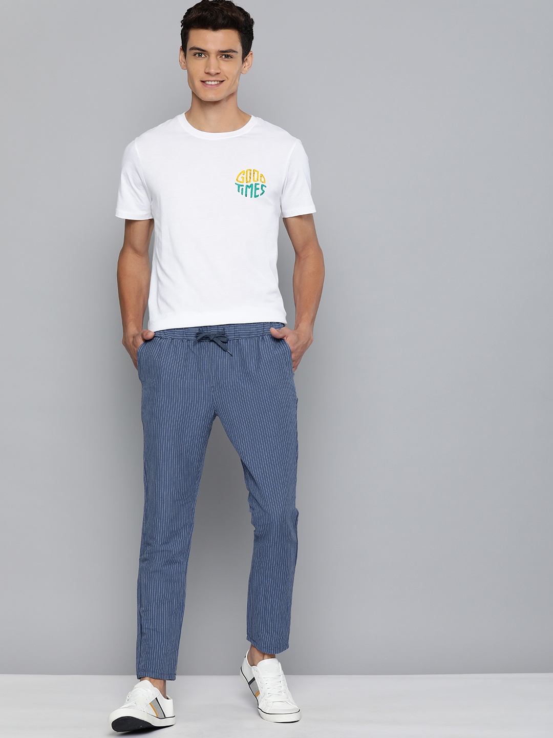 

Mast & Harbour Men Blue & Off White Striped Regular Cotton Linen Trousers