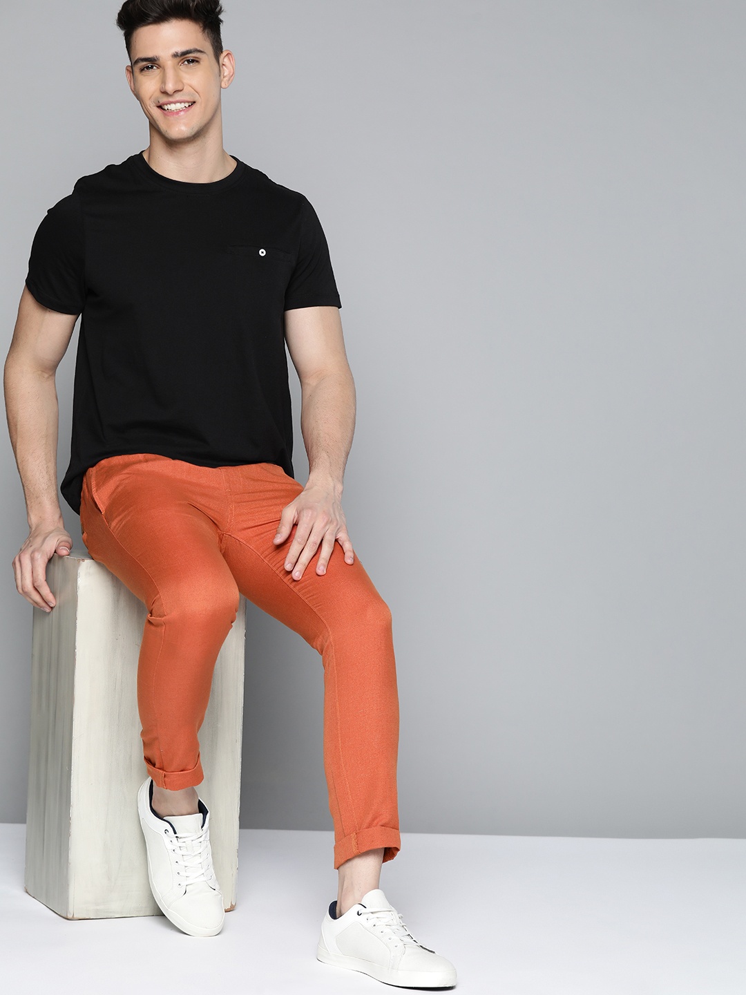 

Mast & Harbour Men Rust Orange Solid Mid-Rise Regular Fit Cotton Linen Trousers
