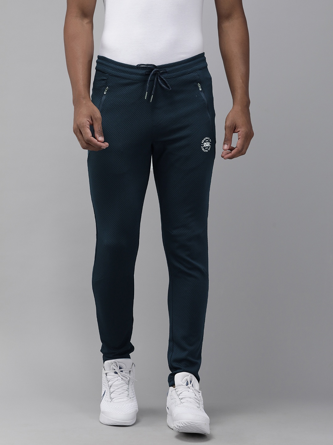 

Jack & Jones Men Navy Blue Self Designed Track Pants