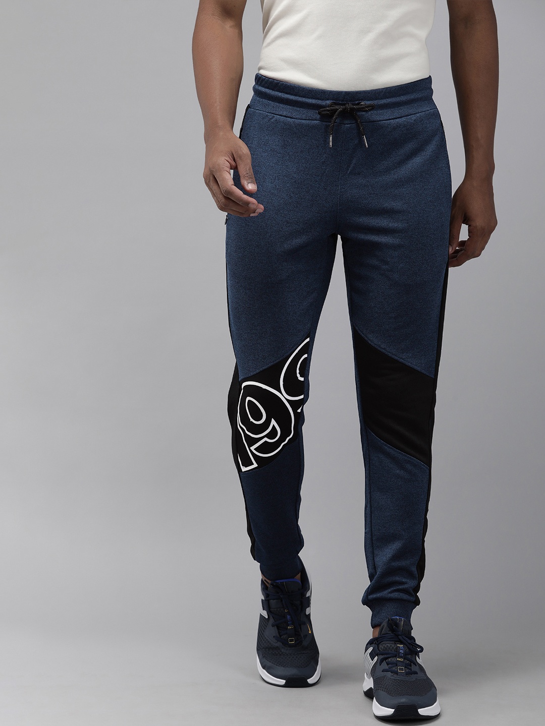 

Jack & Jones Men Navy Blue and Black Colourblocked Gym Track Pants