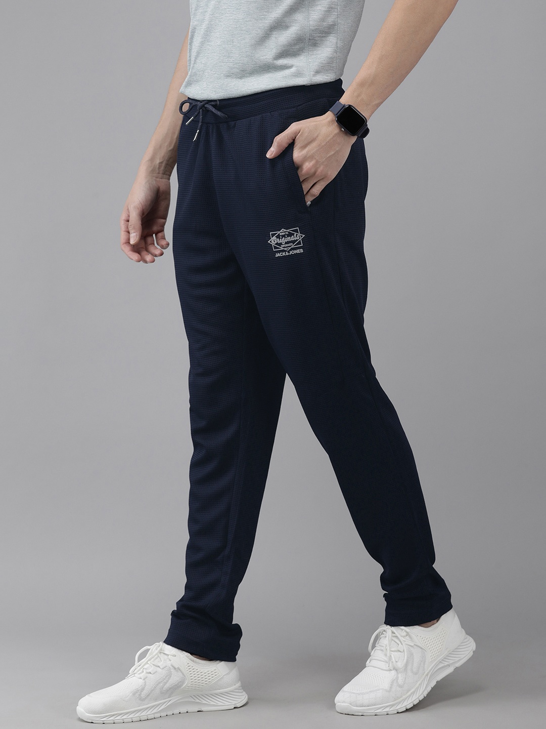 

Jack & Jones Men Navy Blue Self Designed Track Pants